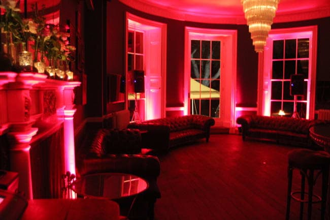 Red LED party lighting creating a dramatic and atmospheric mood