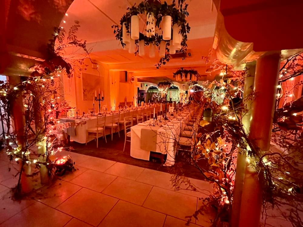 Warm uplighting around an Italian villa exterior after dark