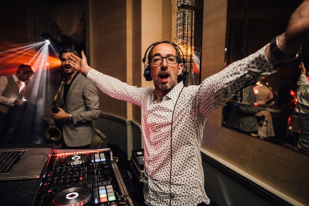 DJ Nige at Babington House with guests dancing on a packed dancefloor