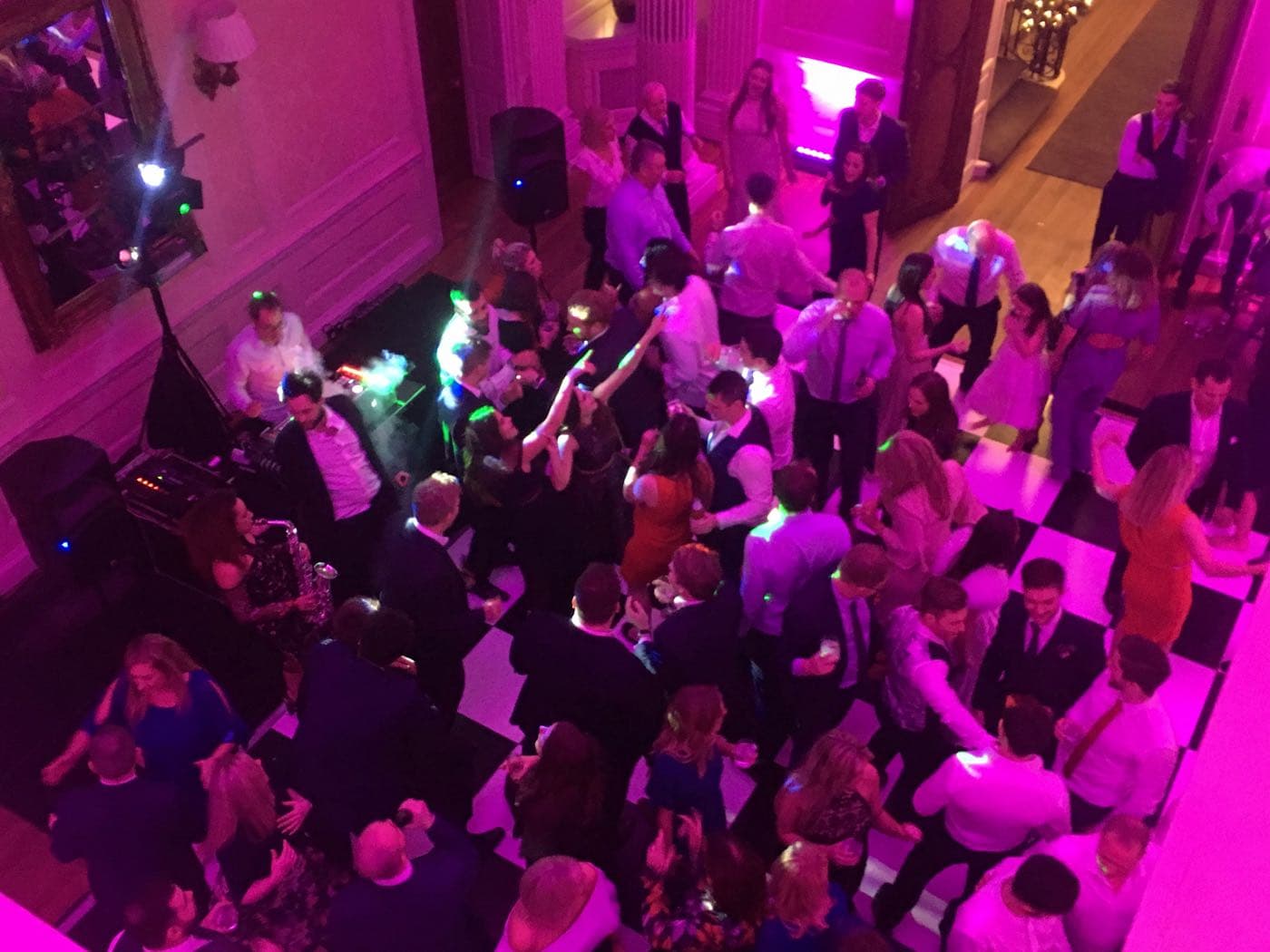 Dance floor with DJ and sax—Bristol wedding entertainment.