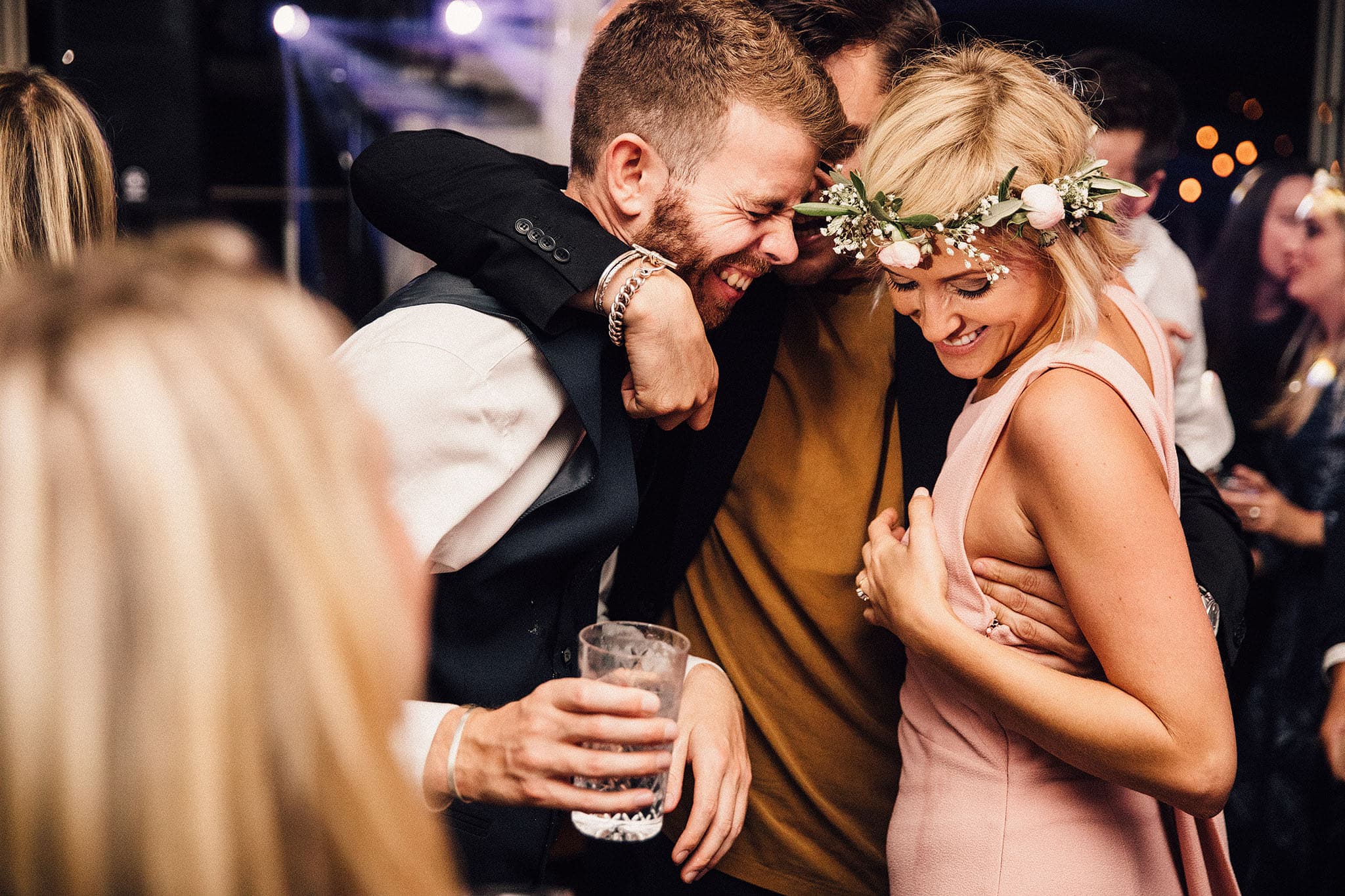 Wedding guests celebrating on the dancefloor at Babington House