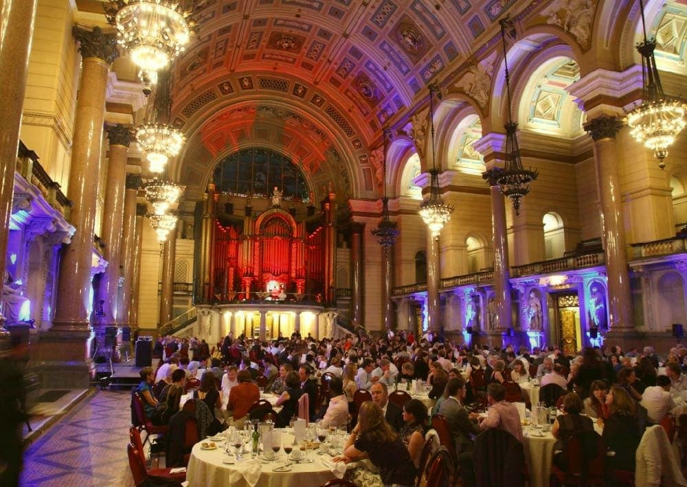 Professional corporate event with sophisticated entertainment and lighting