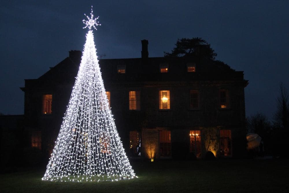 Winter wonderland Christmas party with festive lighting and elegant venue styling