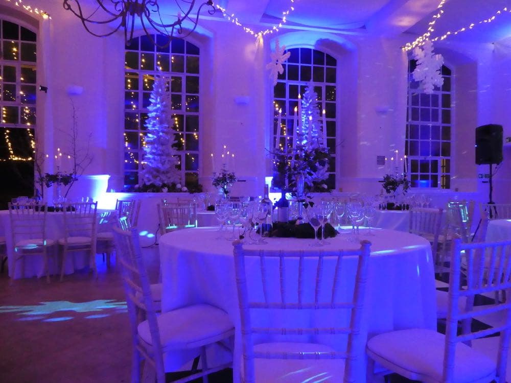 Black tie winter gala Christmas party with elegant venue lighting and formal celebration styling