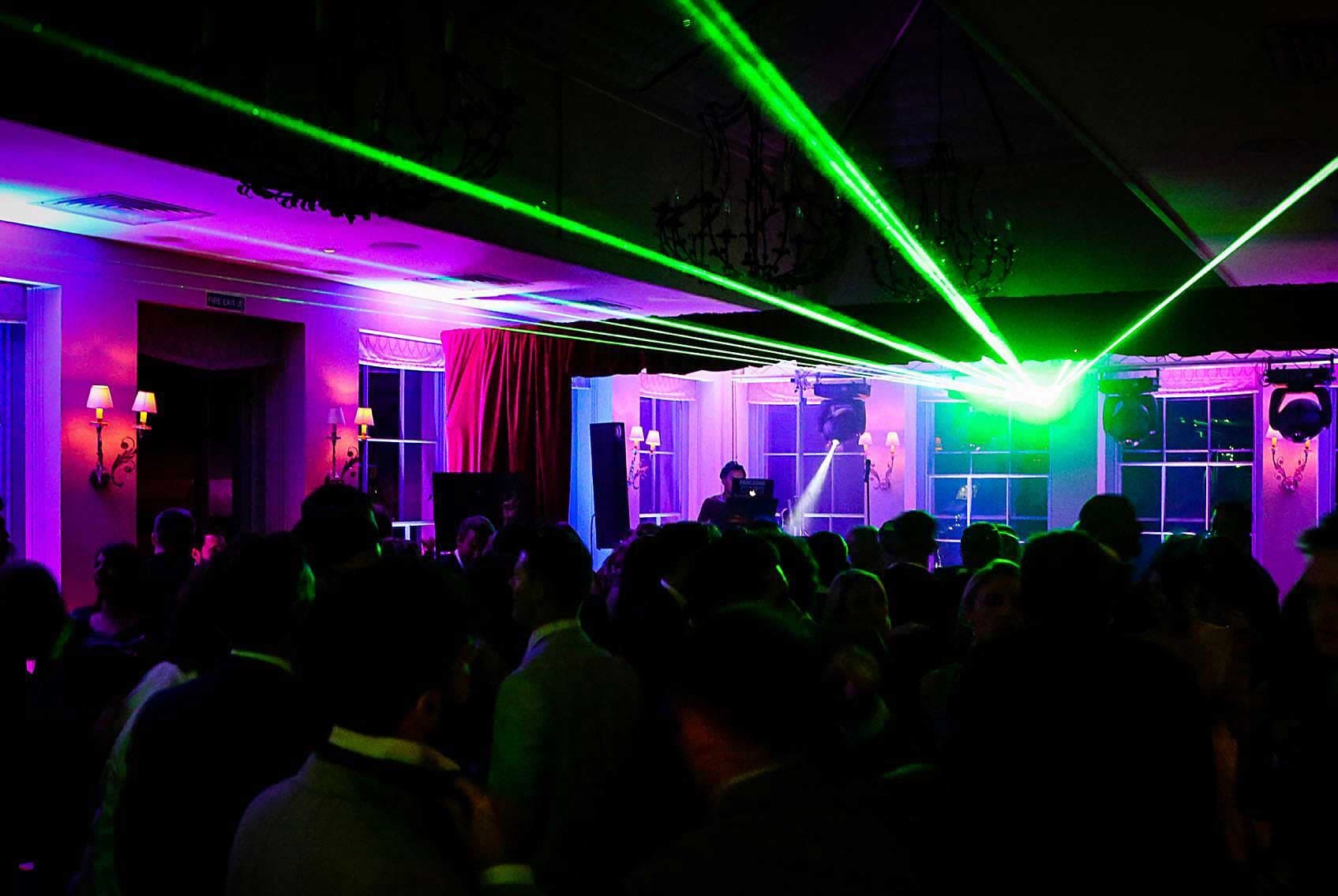 Laser lighting on dance floor for corporate party or celebration