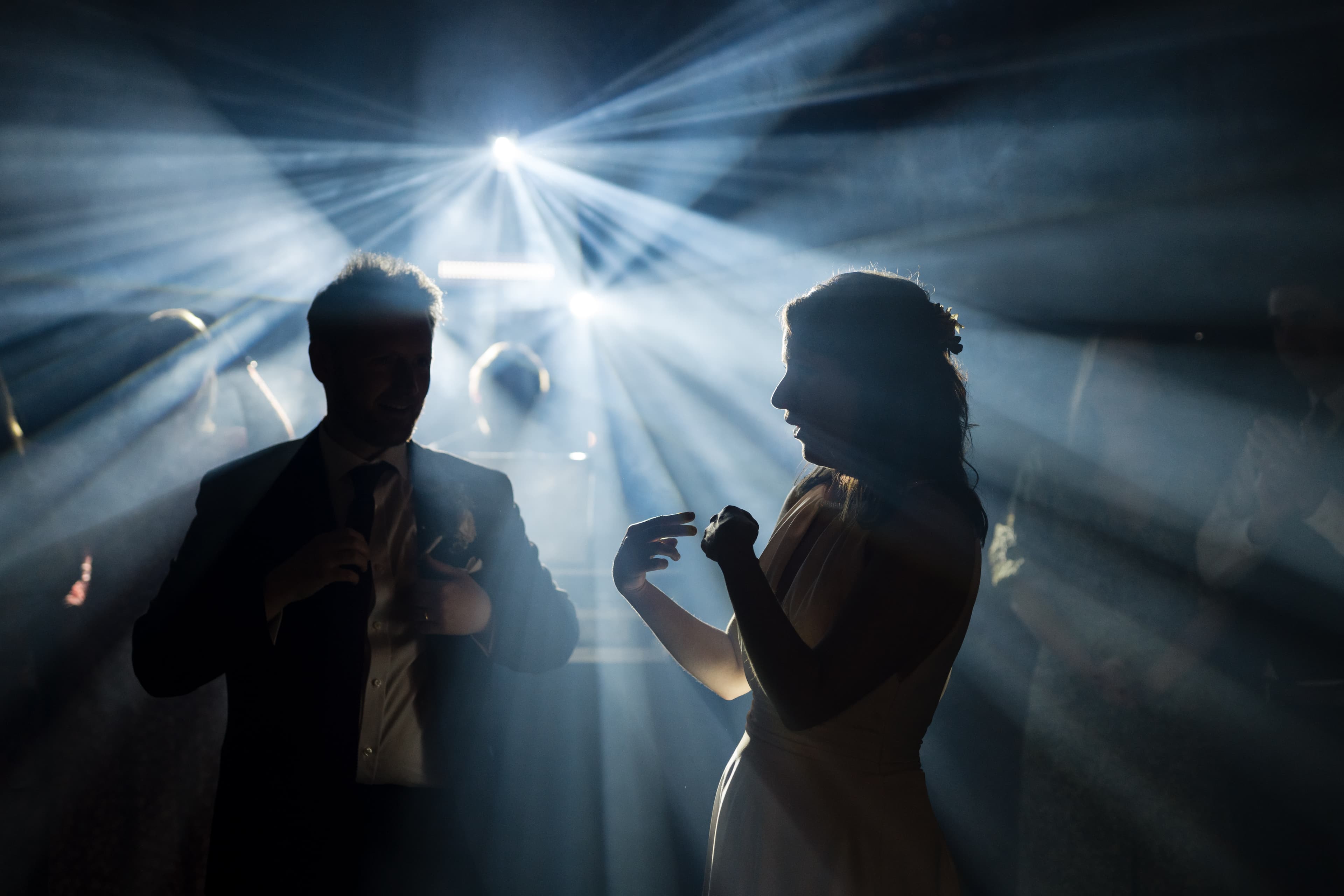 Barn wedding at dusk with warm atmosphere—Somerset wedding DJ and production.