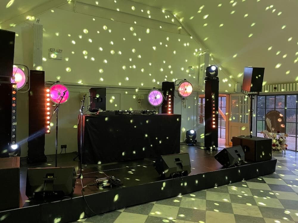 Kin House wedding venue with professional stage lighting and sound equipment hire, showcasing professional wedding entertainment setup