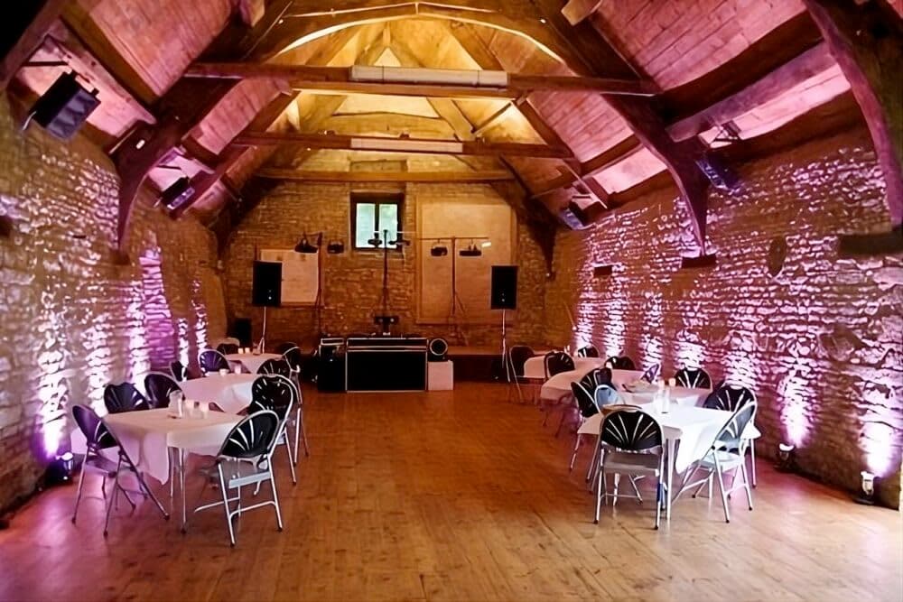 Pink LED up-lights installed for a party at Mells Barn