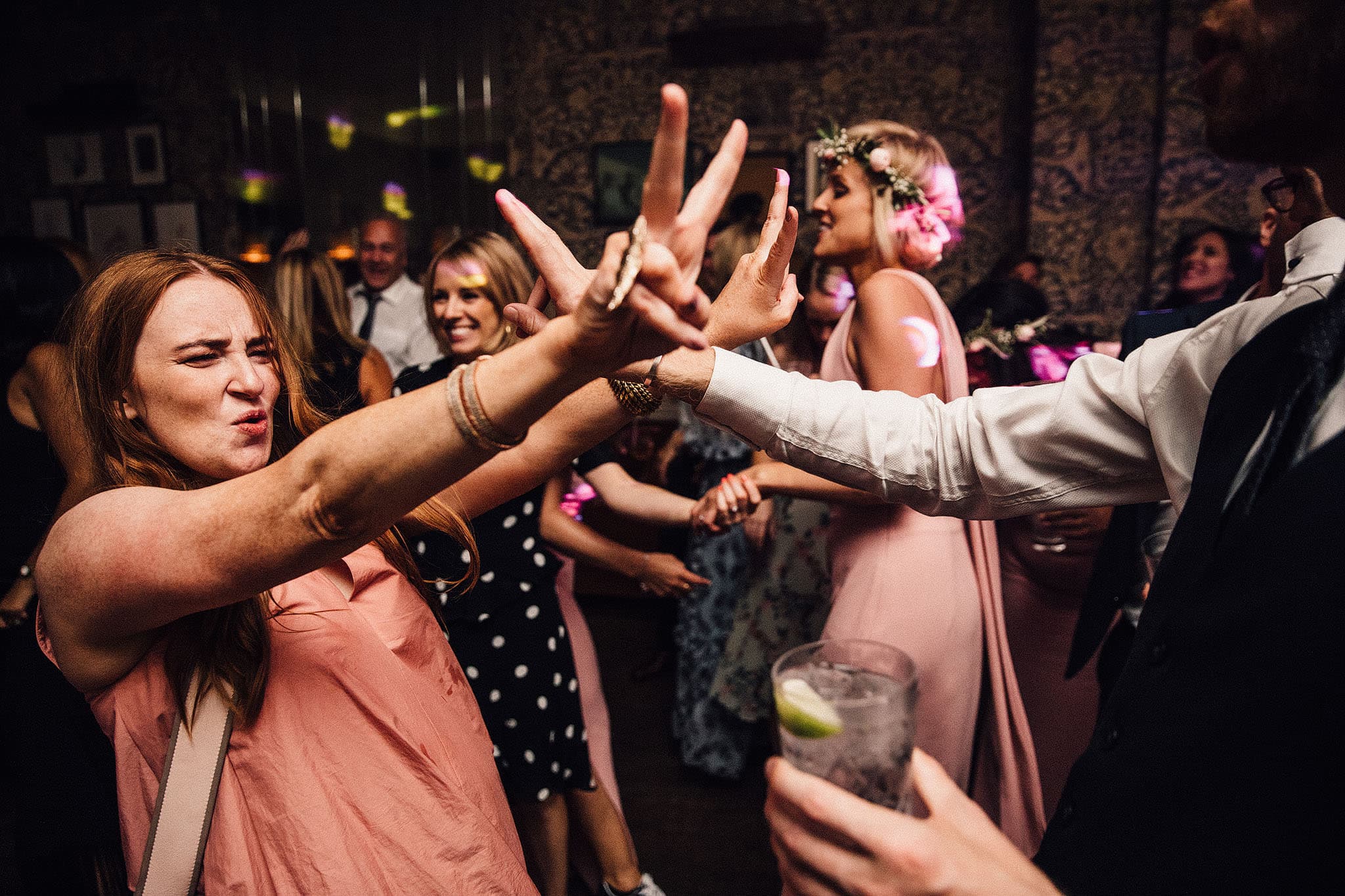 Jade and Emma's wedding celebration with beautiful lighting