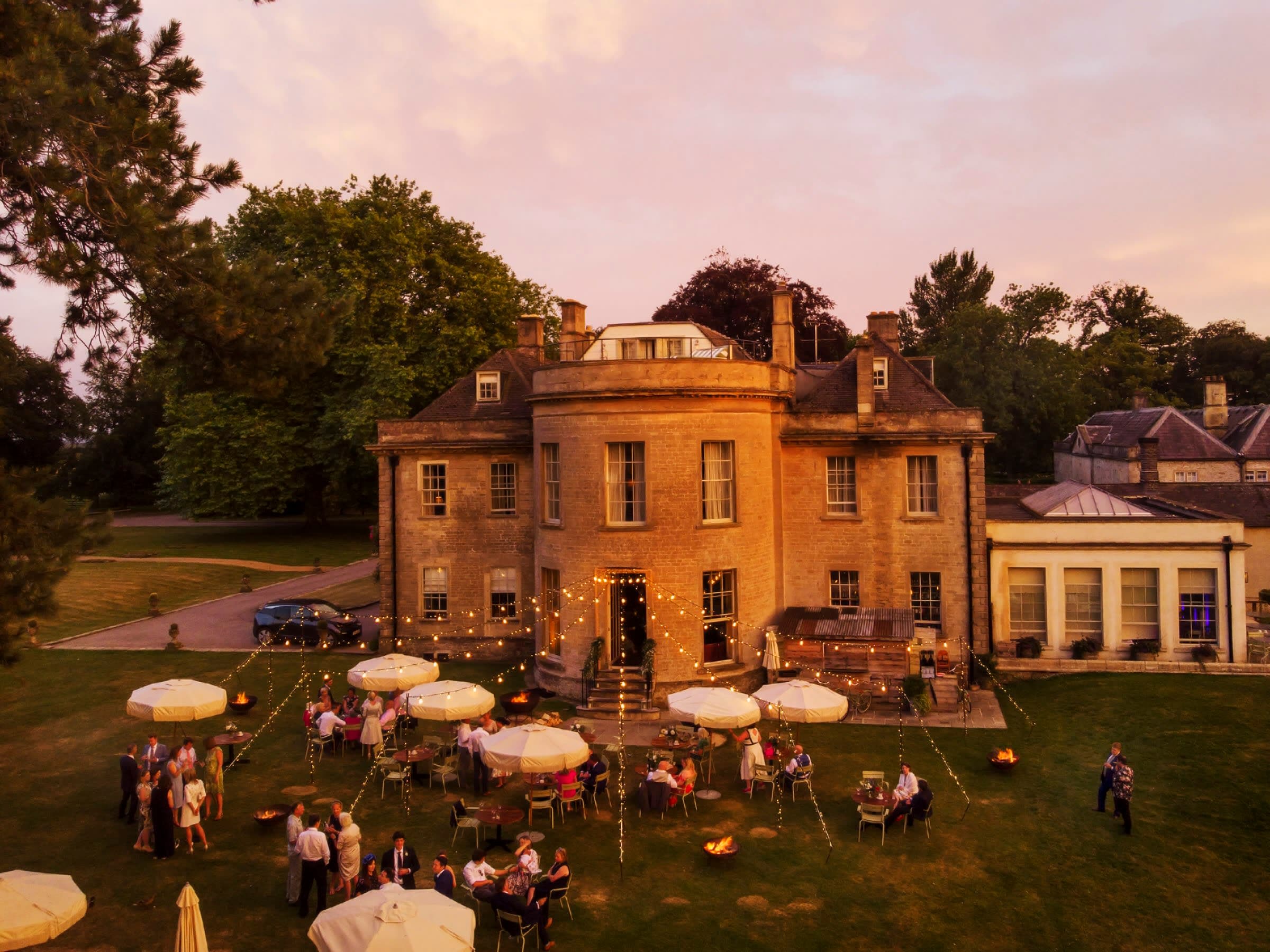 Chill Out Camp lighting installation with vintage Edison festoon and fairy lights at Babington House