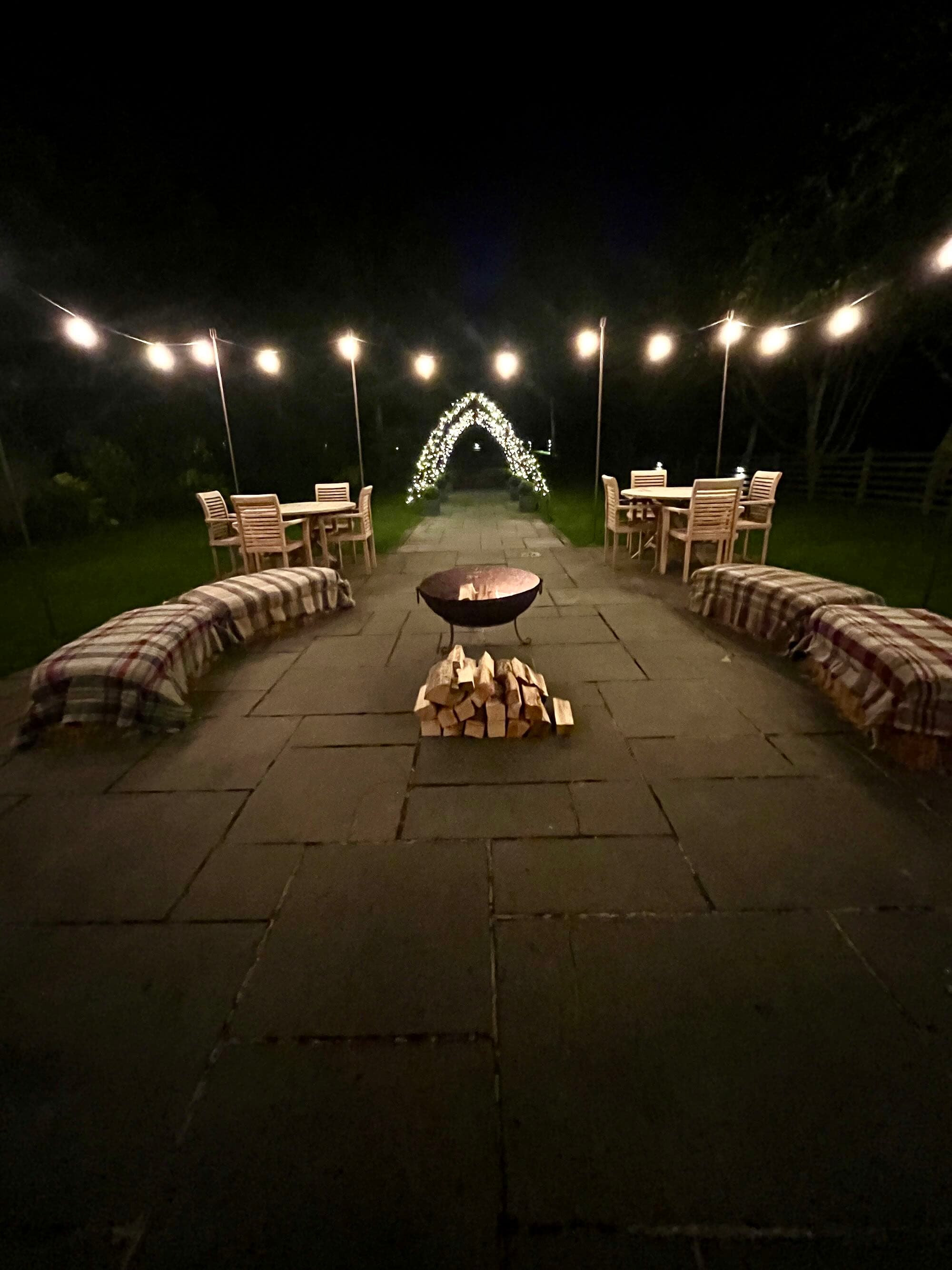 Wild West themed venue entrance with saloon doors and festive lighting at night